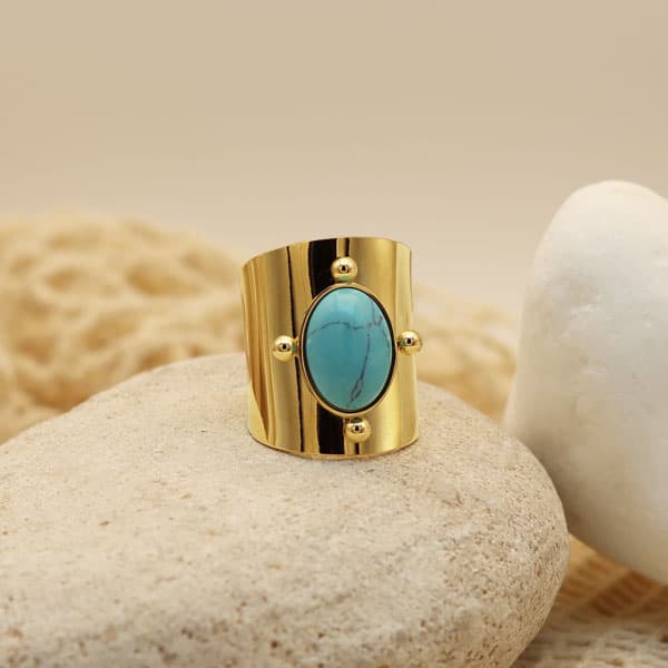 Bague haute dorée sertie d'une pierre naturelle Turquoise