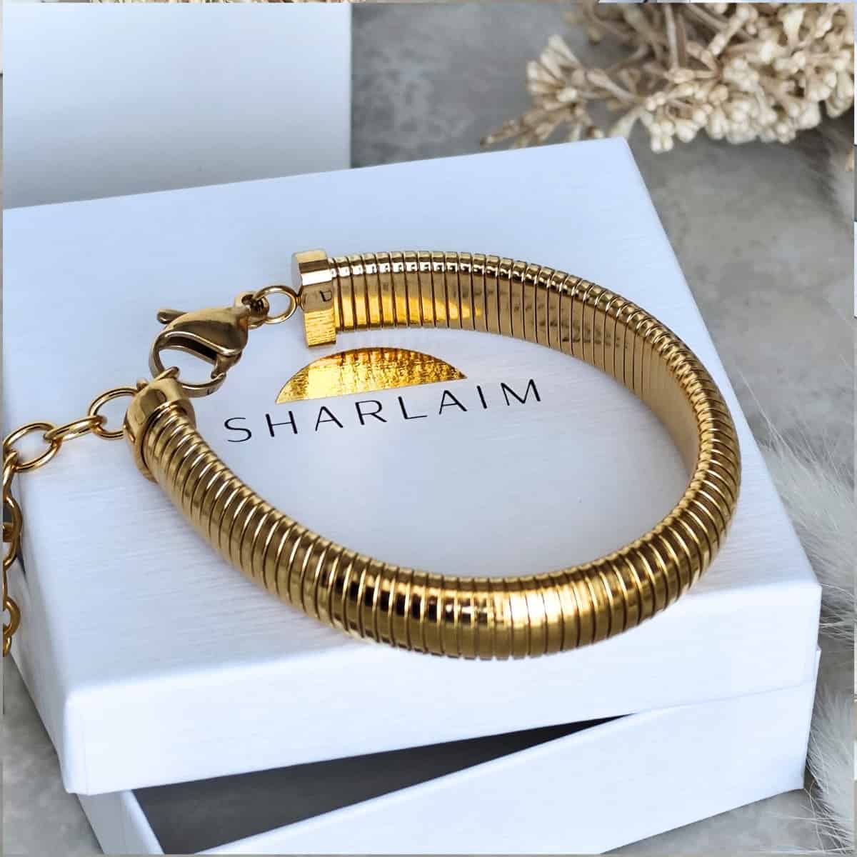 Bracelet en acier inoxydable 316L à maille serpent striée avec barre pivotante texturée doré