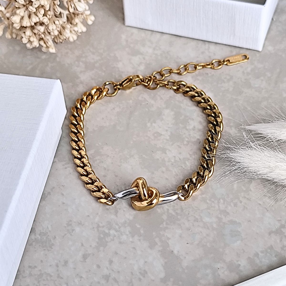 Bracelet maille en acier bi-color au style Bohème tressé avec un noeud au centre