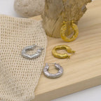 Boucles d'oreilles créoles martelées forme hexagone dorées ou argentées  en acier inoxydable