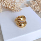 Bague en acier inoxydable  volumineuse aux formes arrondies doré