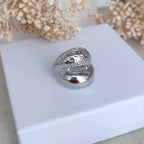 Bague en acier inoxydable  volumineuse aux formes arrondies argentée