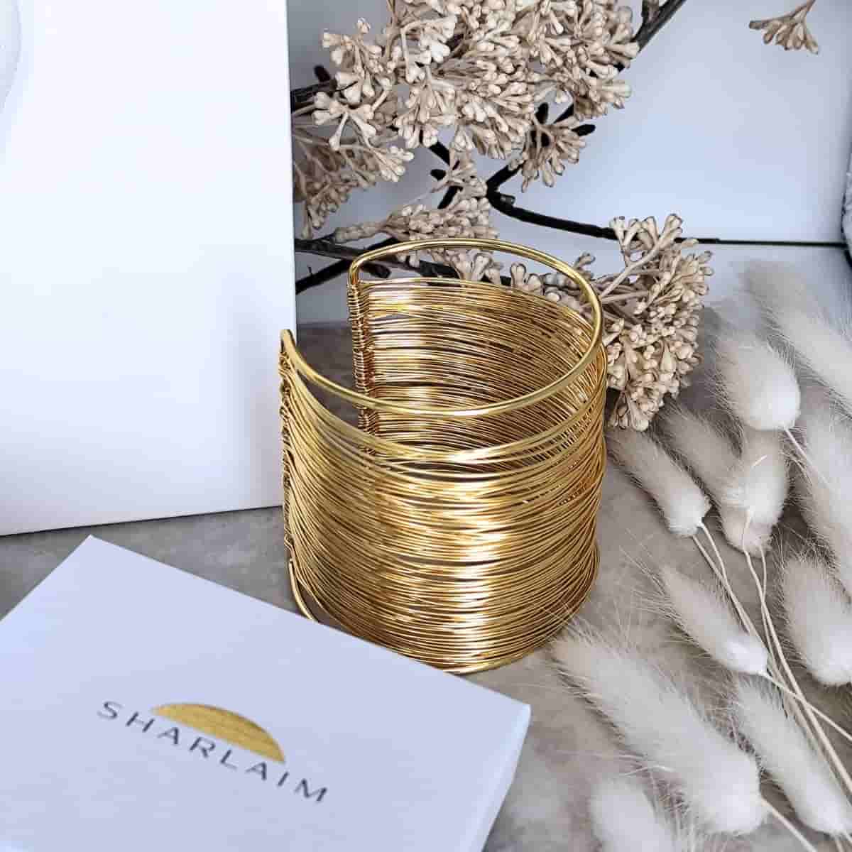 manchette dorée en acier inoxydable  large en forme de spirales superposées